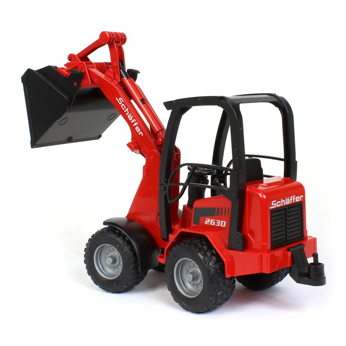 1/16 Schaffer 2630 Compact Loader with Bale Gripper, Bucket & Bale by Bruder - Image 5