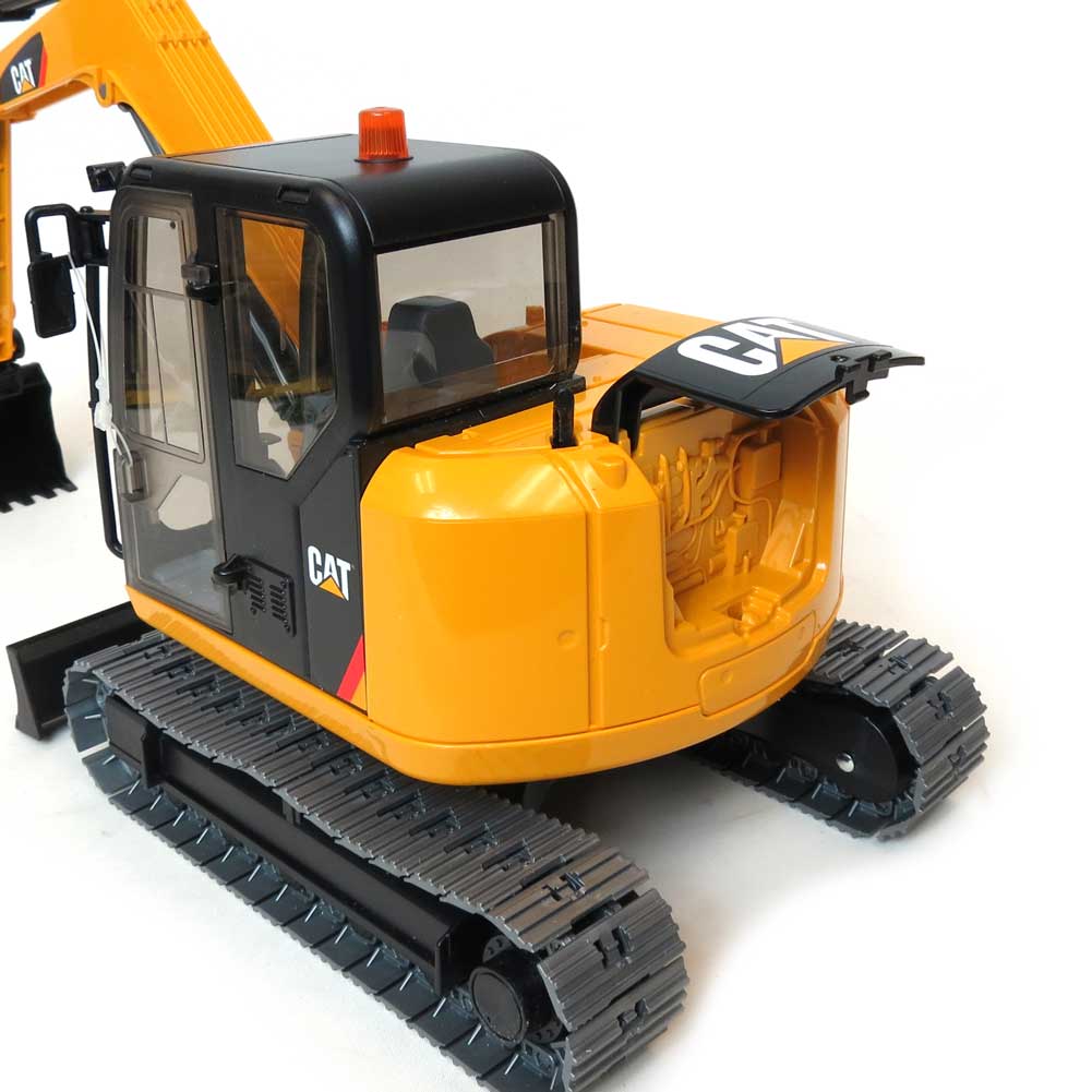 1/16 Caterpillar Mini Excavator with Construction Worker by Bruder - Image 3