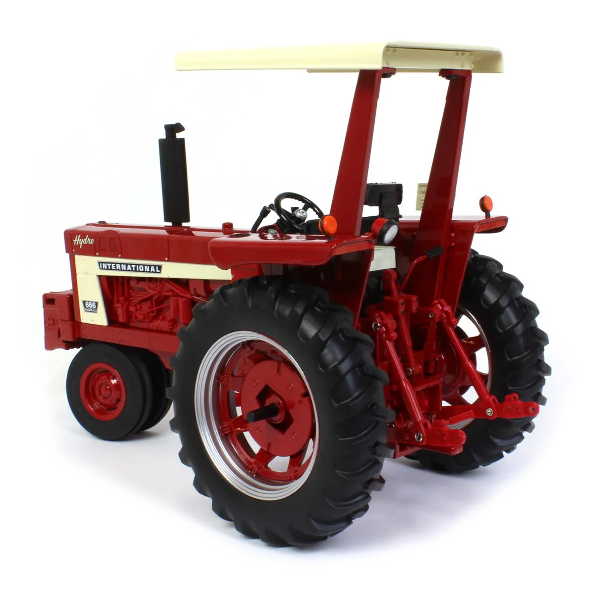 1/16 International 666 Hydro Tractor with Narrow Front, ROPS, & Fender Radio, ERTL Prestige Collection - Image 4