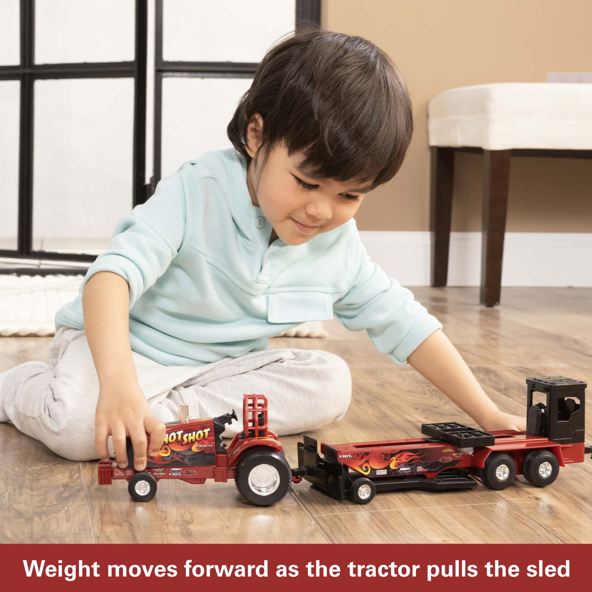 1/32 Case IH "Hot Shot" Pullback Pulling Tractor with Sled - Image 5