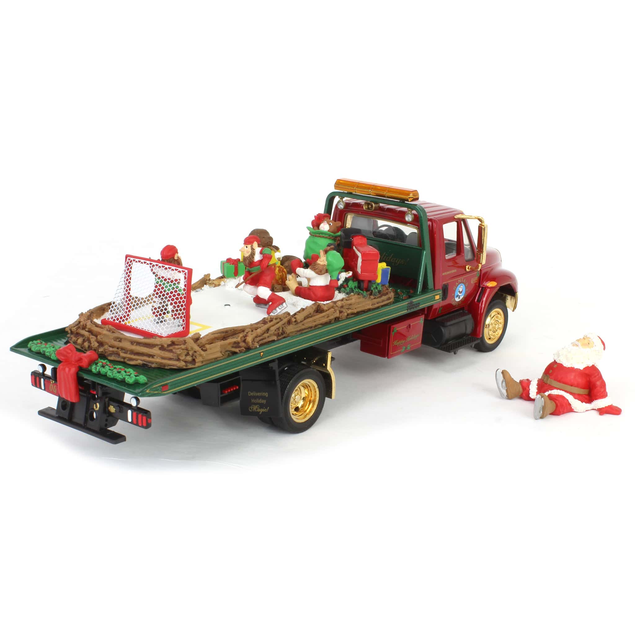 1/34 International 4400 Rollback with "Santa's Express" Cold Cast Load by First Gear - Image 3