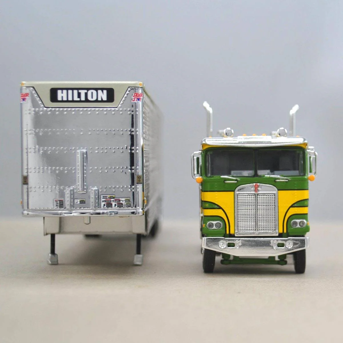 1/64 DCP Green & Yellow Kenworth K100 Long Frame with Wilson Livestock Trailer, Hilton Trucking - Image 2
