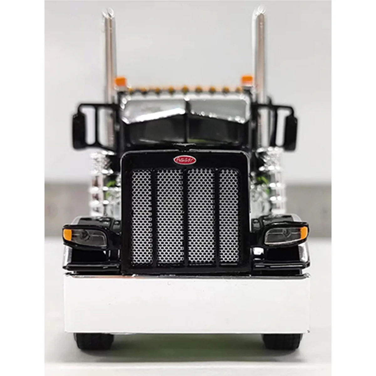 1/64 Lefthander Peterbilt 389 Tow Truck with 36in Sleeper Cab & Rotator Bed, White/Black/Green, DCP by First Gear - Image 3