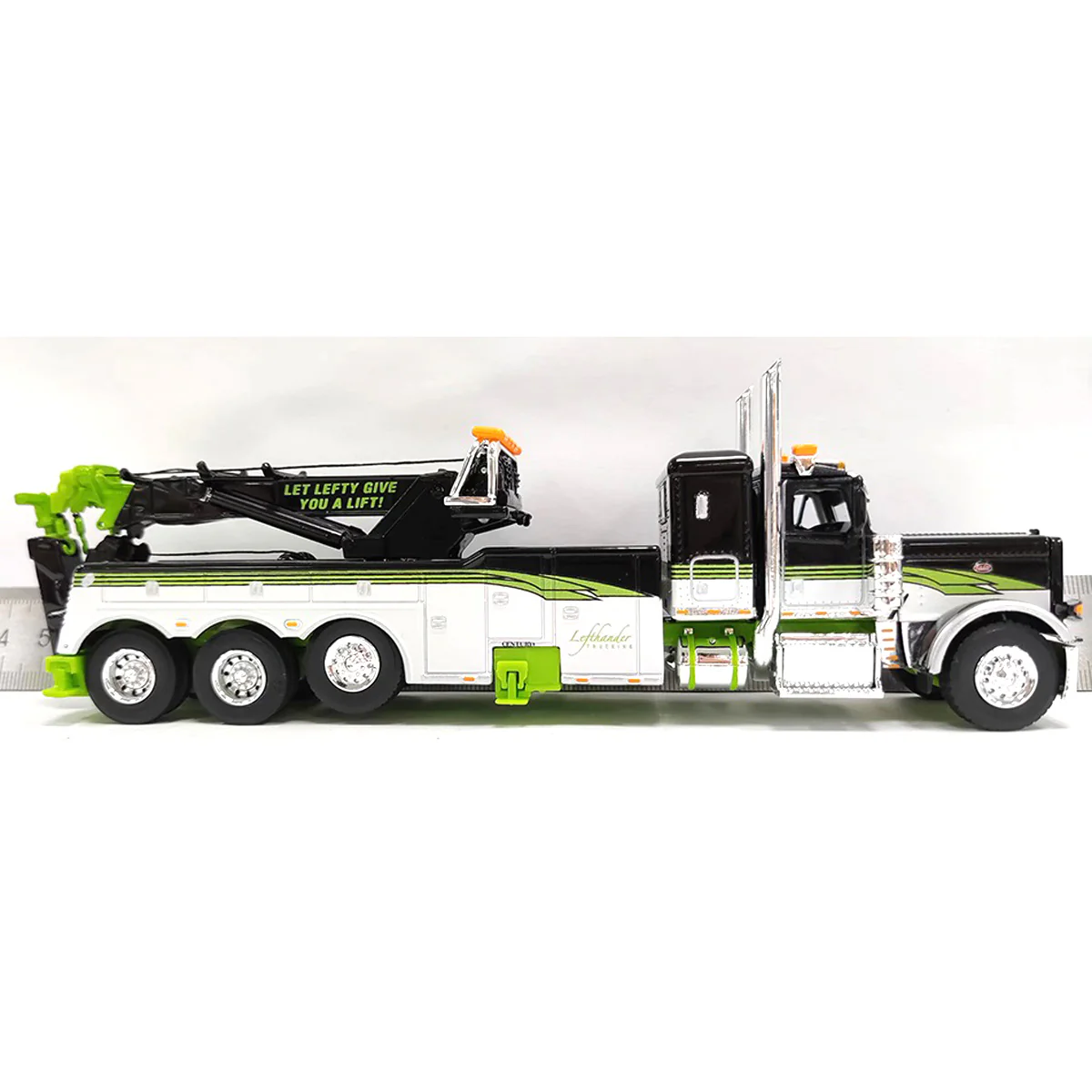 1/64 Lefthander Peterbilt 389 Tow Truck with 36in Sleeper Cab & Rotator Bed, White/Black/Green, DCP by First Gear - Image 4