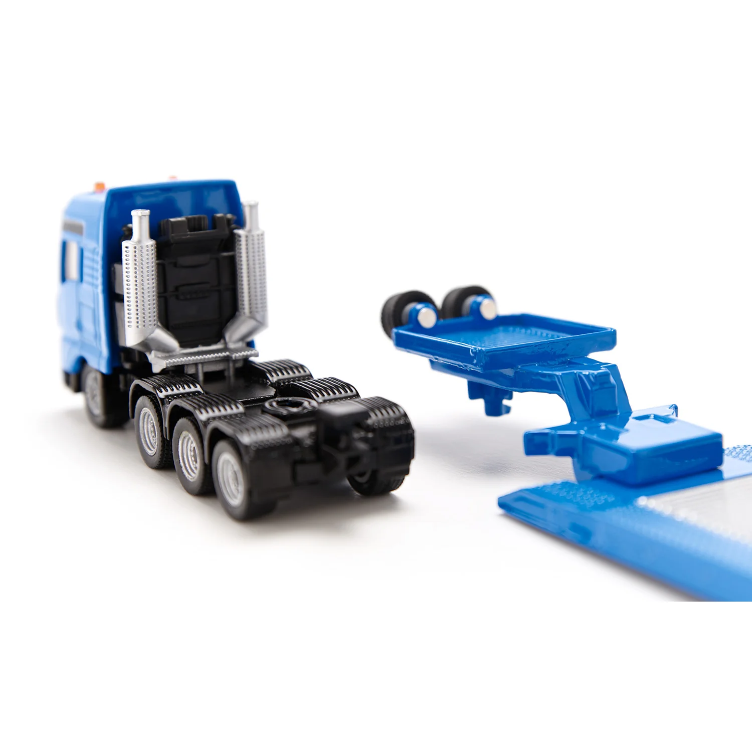 1/87 Liebherr 974 Excavator with MAN Truck & Lowboy Trailer by SIKU - Image 6