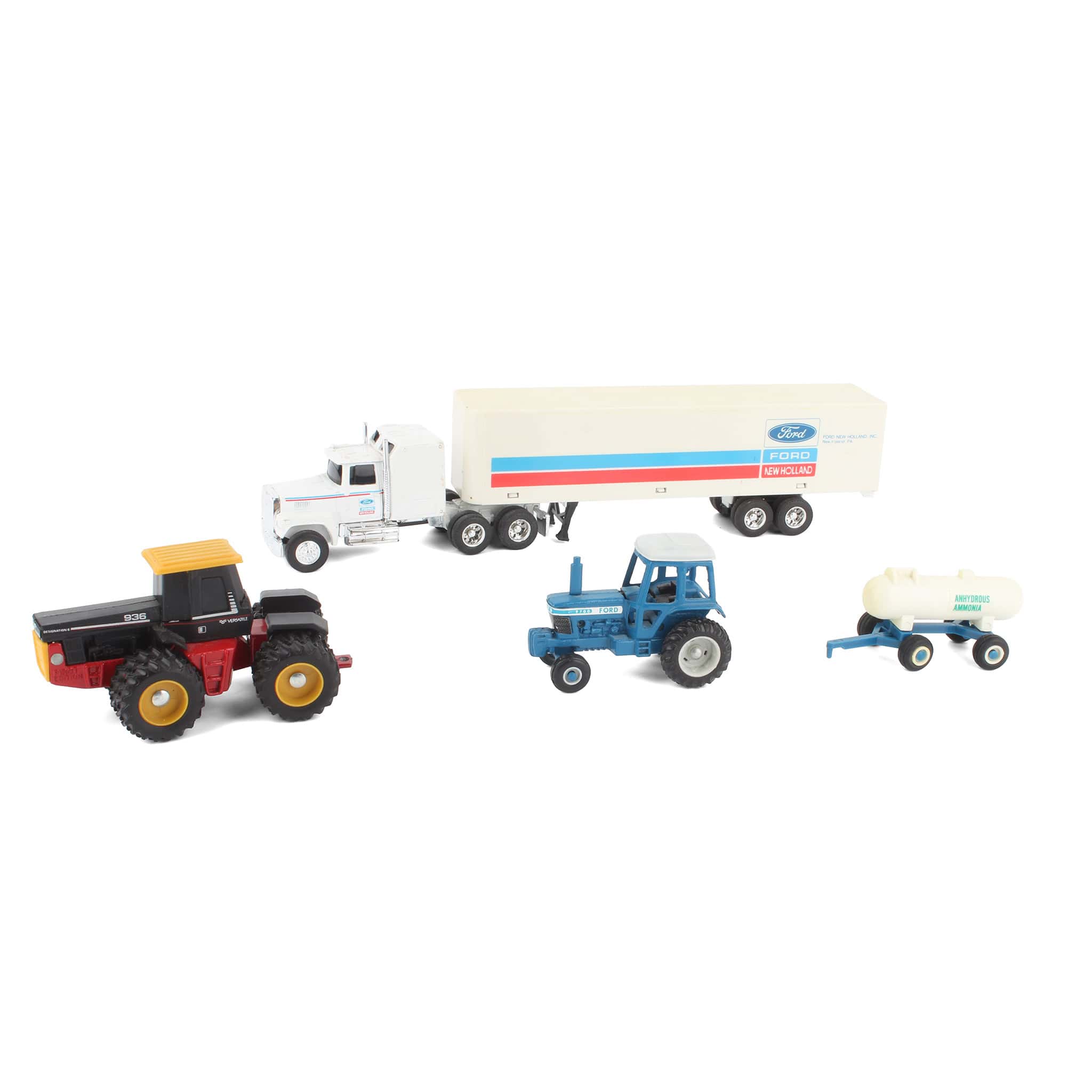 Lot of (1) 1/64 Semi with Trailer, (2) 1/64 Tractors, and (1) 1/64 Farm Implement
