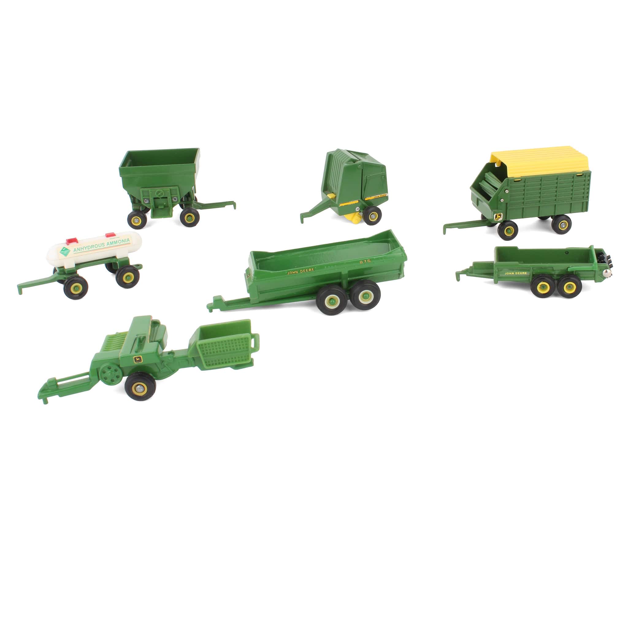 Lot of (2) 1/64 John Deere Manure Spreaders, (2) 1/64 John Deere Wagons, (2) 1/64 John Deere Balers and (1) 1/64 Tank Wagon