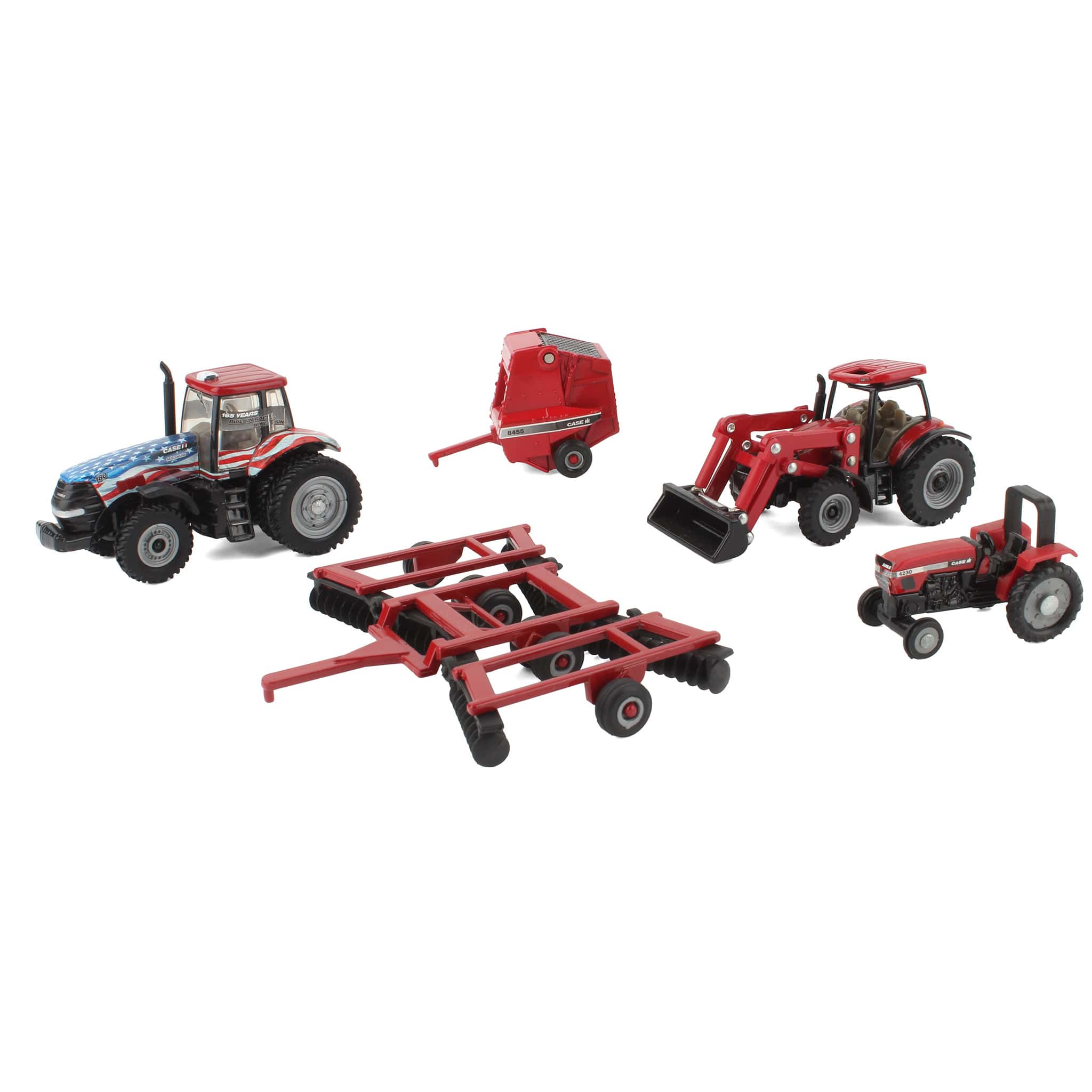 Lot of (3) 1/64 Case IH Tractors, (1) 1/64 Folding Wing Disc, and (1) Case IH Round Baler by ERTL