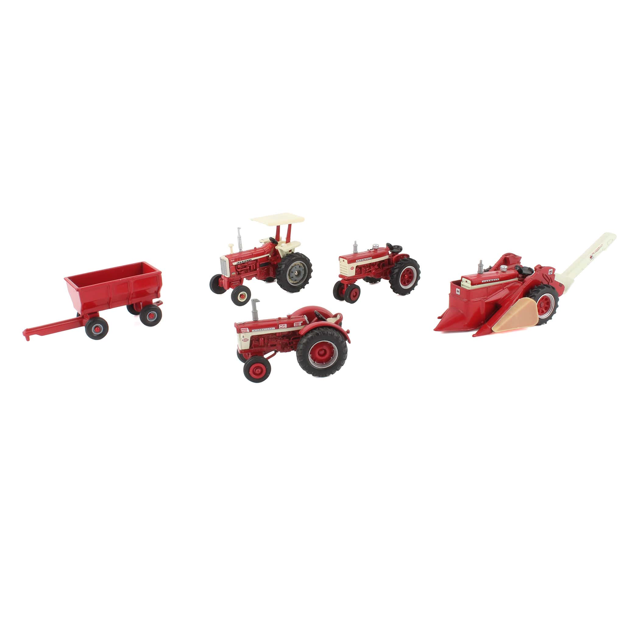 Lot of (3) Farmall Tractors, (1) 1/64 International Tractor, (1) 1/64 Mounted Picker, and (1) Barge Wagon by ERTL
