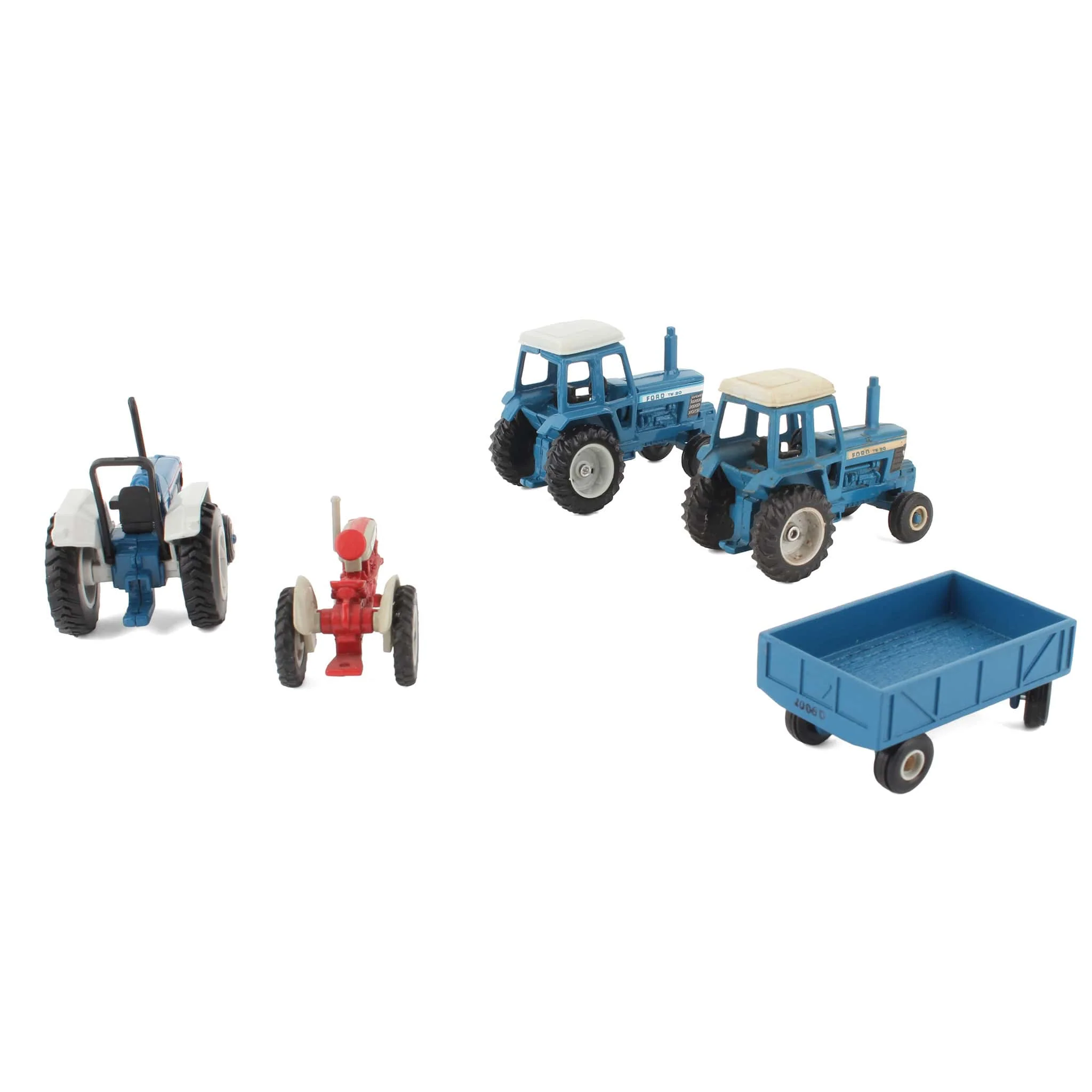 Lot of (4) 1/64 Ford Tractors and (1) 1/64 Blue Barge Wagon by ERTL - Image 2